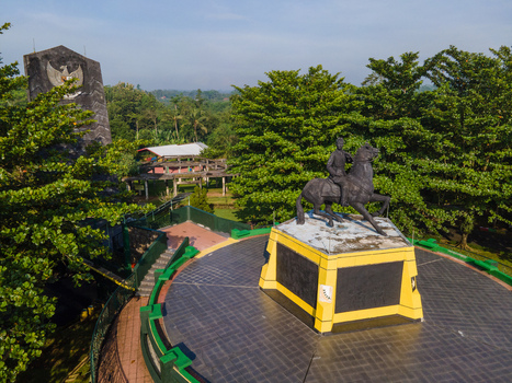 Purwokerto Indonesia 08 May 2026 Aerial view of the National Monument of Jendral Soedirman featuring the equestrian statue and Garuda emblem surrounded by lush greenery. Purwokerto Indonesia 08 May 2026 Aerial view of the National Monument of Jendral Soedirman featuring the equestrian statue and Garuda emblem surrounded by lush greenery.