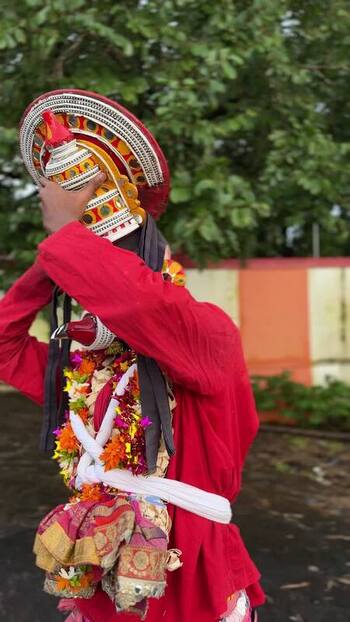View of a traditional Theyyam dancer in Kochi India. View of a traditional Theyyam dancer in Kochi India.
