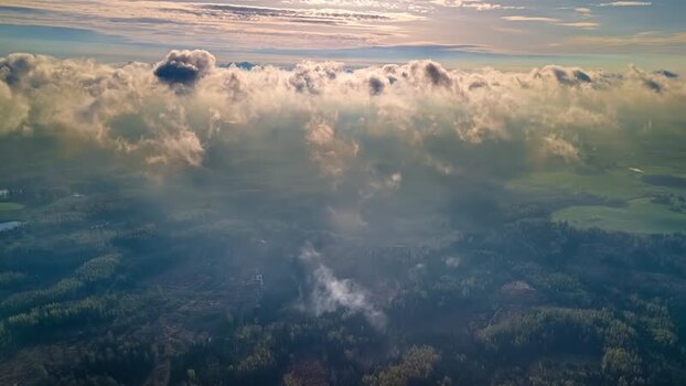 Aerial view of forest landscape under clouds in Latvia. Aerial view of forest landscape under clouds in Latvia.
