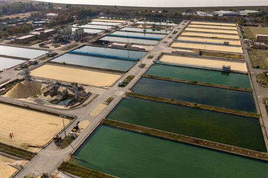 Aerial view of Ashford Common Water Treatment Works with large rectangular water filtration tanks and sand beds in Shepperton England United Kingdom. Aerial view of Ashford Common Water Treatment Works with large rectangular water filtration tanks and sand beds in Shepperton England United Kingdom.