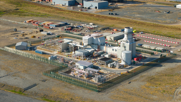 Aerial view of Millbrook Power Plant with its industrial structures power generation equipment and fenced perimeter in Stewartby England United Kingdom. Aerial view of Millbrook Power Plant with its industrial structures power generation equipment and fenced perimeter in Stewartby England United Kingdom.