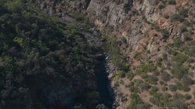 Aerial view of Onkaparinga Gorge with rocky cliffs and river Australia.