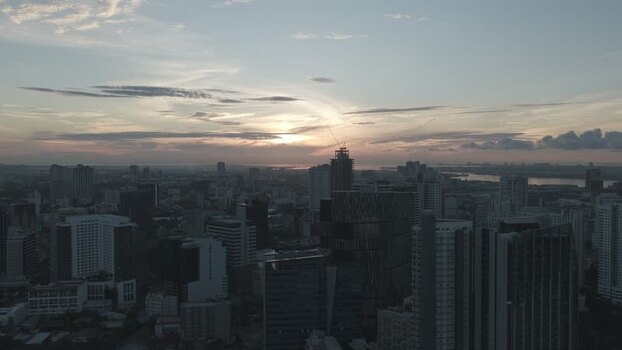 Aerial view of the city skyline at sunset in Philippines.