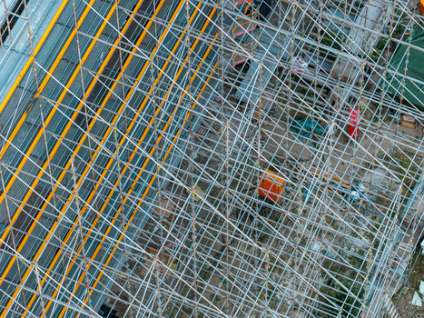 Aerial view of metal scaffolding surrounding a building facade at the Helmholtz Zentrum Berlin Science Campus in Berlin Berlin Germany.
