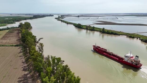 Aerial view of a cargo ship on the Guadalquivir river Spain. Aerial view of a cargo ship on the Guadalquivir river Spain.
