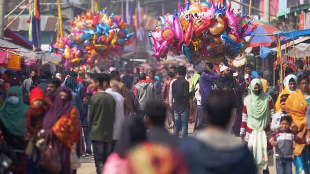 View of a crowded street market with colorful balloons Bangladesh. View of a crowded street market with colorful balloons Bangladesh.