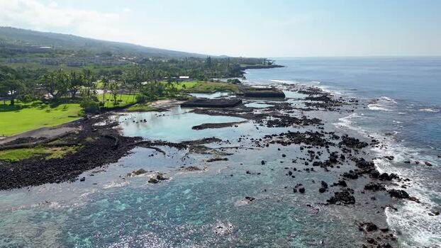 Aerial view of Kahalu u Beach Park and the rocky coastline United States.