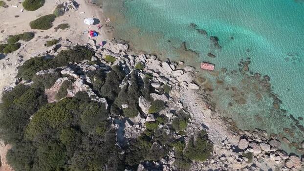 Aerial view of rocky coastline and turquoise waters Northern Cyprus.