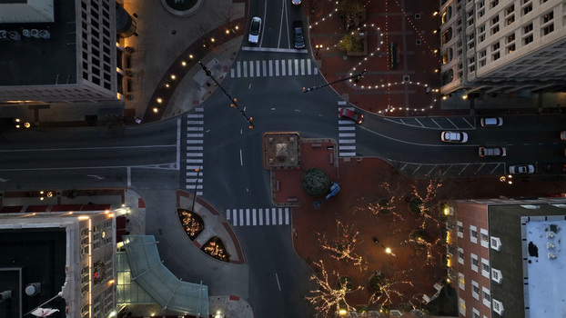 Aerial view of the intersection in Lancaster City decorated with festive Christmas lights at night featuring illuminated trees and city streets in Lancaster Pennsylvania United States. Aerial view of the intersection in Lancaster City decorated with festive Christmas lights at night featuring illuminated trees and city streets in Lancaster Pennsylvania United States.
