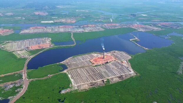 Aerial view of brick factories amidst greenery Bangladesh. Aerial view of brick factories amidst greenery Bangladesh.