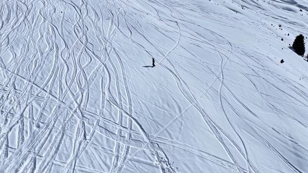 Aerial view of skier on snowy slopes in Nauders Austria.