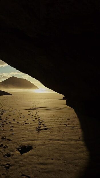 View of Wharariki Beach archway New Zealand. View of Wharariki Beach archway New Zealand.