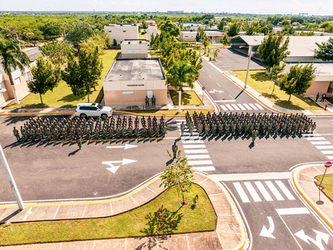 Aerial view of military personnel standing in formation at the Base de Infanteria de Marina Valm. Manuel Ramon Montes Arache in Boca Chica Santo Domingo Dominican Republic. Aerial view of military personnel standing in formation at the Base de Infanteria de Marina Valm. Manuel Ramon Montes Arache in Boca Chica Santo Domingo Dominican Republic.