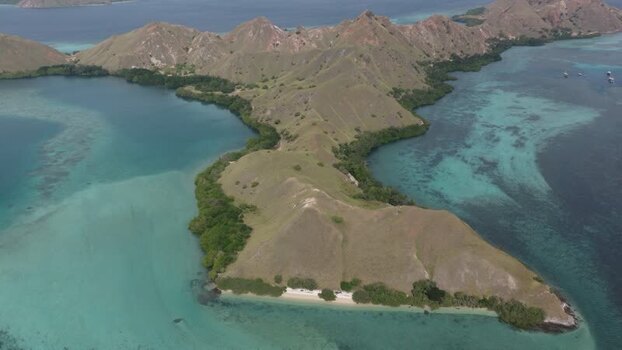 Aerial view of Komodo Island with turquoise waters Indonesia.