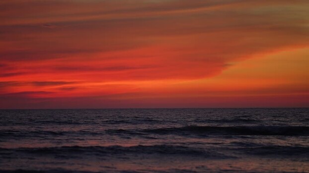 View of vibrant sunset over the ocean at Cox s Bazar Bangladesh. View of vibrant sunset over the ocean at Cox s Bazar Bangladesh.