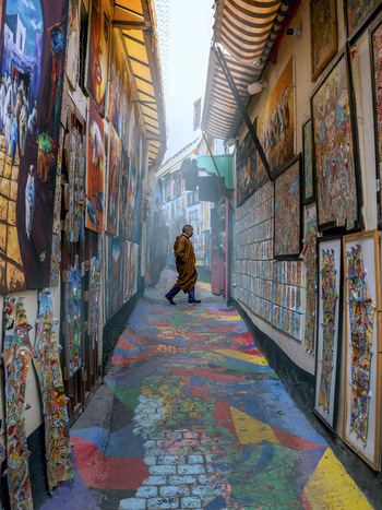 Fes Morocco 03 March 2024 View of colorful paintings in a narrow alley with vibrant street art Fes Morocco.