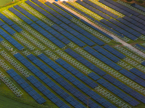 Aerial view of the FVE Bohumilice solar farm with rows of photovoltaic panels installed on a green field in Klobouky u Brna Jihomoravsky kraj Czechia. Aerial view of the FVE Bohumilice solar farm with rows of photovoltaic panels installed on a green field in Klobouky u Brna Jihomoravsky kraj Czechia.
