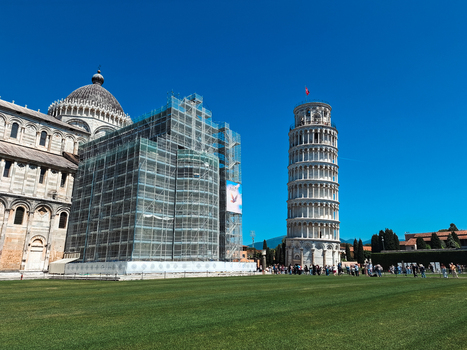 Pisa Italy 27 April 2026 View of the Leaning Tower of Pisa and the adjacent cathedral undergoing restoration with scaffolding on a clear sunny day. Pisa Italy 27 April 2026 View of the Leaning Tower of Pisa and the adjacent cathedral undergoing restoration with scaffolding on a clear sunny day.