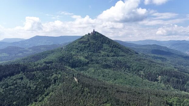 Aerial view of Haut Koenigsbourg Castle on a forested hill France.