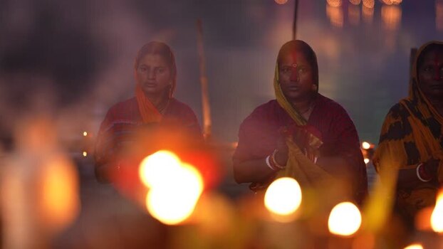 View of women performing a religious ritual with lamps Bangladesh. View of women performing a religious ritual with lamps Bangladesh.