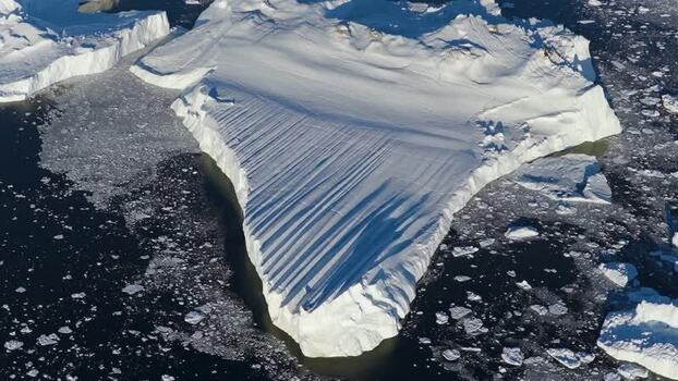 Aerial view of Ilulissat glacier iceberg in Greenland.