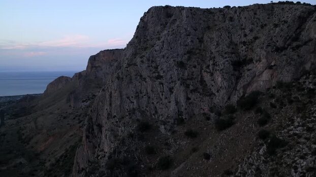 Aerial view of rocky cliffs in Terrasini Italy.
