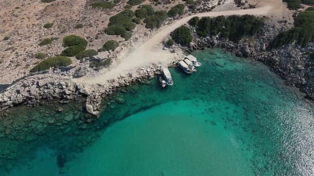 Aerial view of boats in a turquoise bay in Famagusta Northern Cyprus.