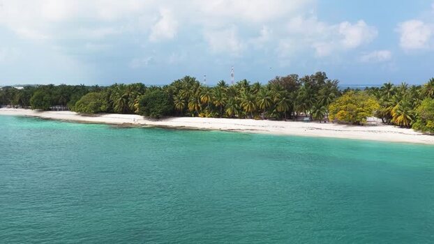 Aerial view of a tropical island with palm trees Maldives. Aerial view of a tropical island with palm trees Maldives.