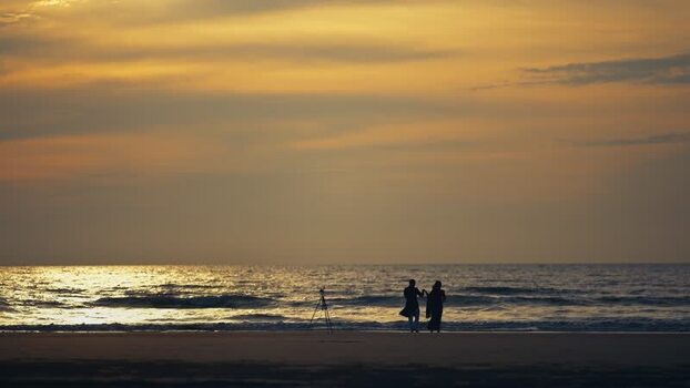 View of people on the beach at sunset in Cox s Bazar Bangladesh. View of people on the beach at sunset in Cox s Bazar Bangladesh.