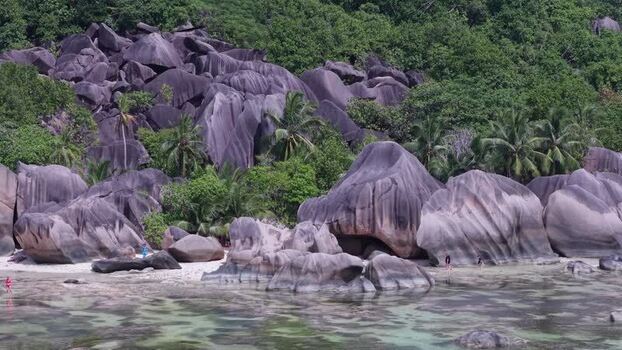 Aerial view of Anse Reunion beach with granite boulders Seychelles.