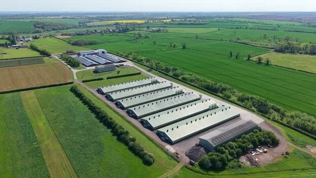 Aerial view of an industrial farm and green fields United Kingdom. Aerial view of an industrial farm and green fields United Kingdom.