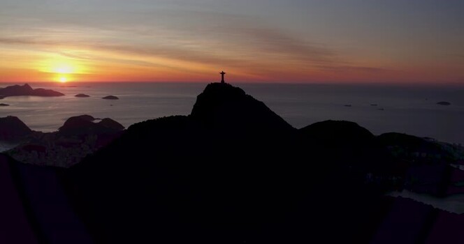 Aerial view of Christ the Redeemer at sunset Brazil.