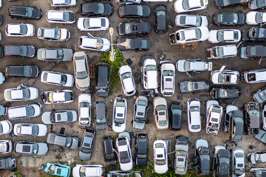 Aerial view of cars junk yard with rows of parked and salvaged vehicles in an outdoor lot in Petah Tikva Center District Israel. Aerial view of cars junk yard with rows of parked and salvaged vehicles in an outdoor lot in Petah Tikva Center District Israel.