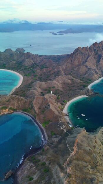 Aerial view of the rugged hills and bays of Komodo National Park Indonesia. Aerial view of the rugged hills and bays of Komodo National Park Indonesia.