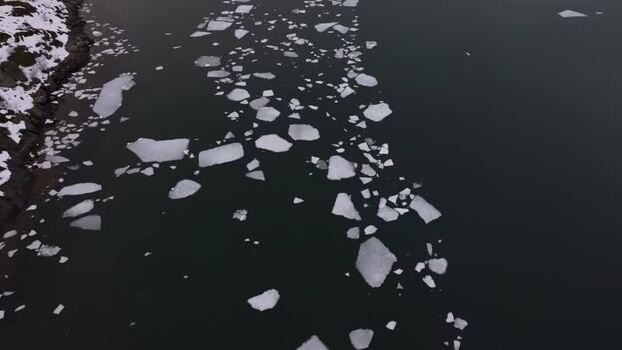 Aerial view of ice floes in the waters of Lofoten Norway.