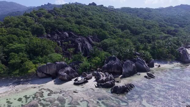 Aerial view of Anse Reunion granite boulders Seychelles.