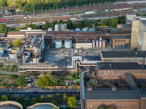 Aerial view of Heizkraftwerk Klingenberg combined heat and power plant featuring industrial pipelines storage tanks and brick buildings in Berlin Berlin Germany. Aerial view of Heizkraftwerk Klingenberg combined heat and power plant featuring industrial pipelines storage tanks and brick buildings in Berlin Berlin Germany.