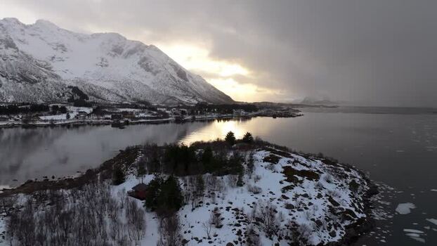 Aerial view of Lofoten mountains and cabin Norway.