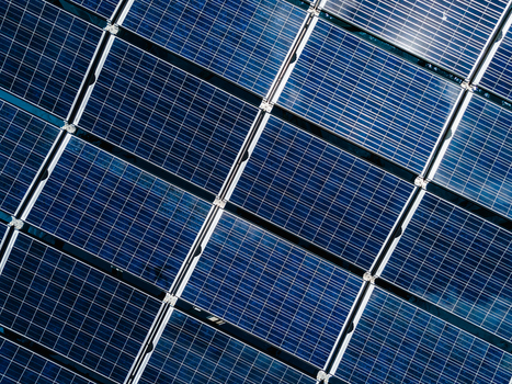 Aerial view of SolarSea floating solar power plant panels with blue photovoltaic cells and metallic frames Dharavandhoo Baa Atoll Maldives. Aerial view of SolarSea floating solar power plant panels with blue photovoltaic cells and metallic frames Dharavandhoo Baa Atoll Maldives.
