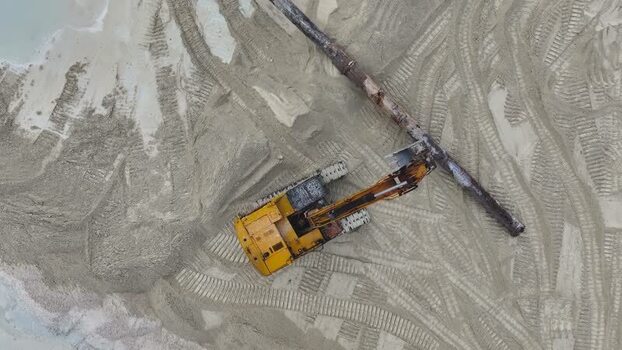 Aerial view of an excavator at a construction site Maldives.