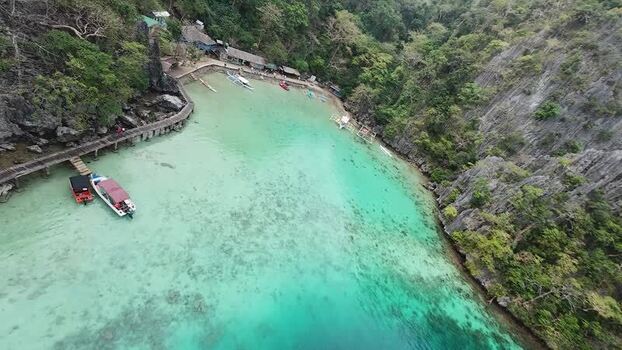 FPV aerial view of Kayangan Lake in Coron Philippines. FPV aerial view of Kayangan Lake in Coron Philippines.