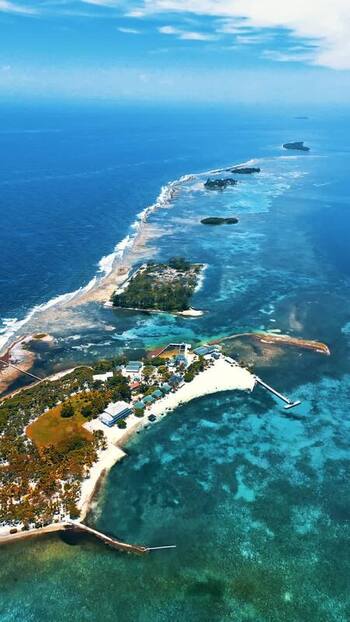 Aerial view of Guanaja island with coral reefs and turquoise water Honduras. Aerial view of Guanaja island with coral reefs and turquoise water Honduras.