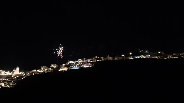 View of fireworks over Fira Greece. View of fireworks over Fira Greece.