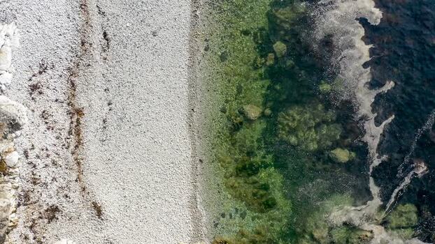 Aerial view of Glenlough Bay coastline in Ireland.