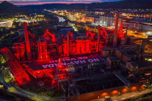 Volklingen Germany 09 May 2026 Aerial view of Volklingen Ironworks illuminated with red lights at night featuring the industrial complex tall chimneys and city lights. Volklingen Germany 09 May 2026 Aerial view of Volklingen Ironworks illuminated with red lights at night featuring the industrial complex tall chimneys and city lights.