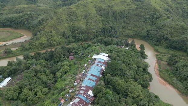 Aerial view of Batang Ai longhouse in Lubok Antu Malaysia. Aerial view of Batang Ai longhouse in Lubok Antu Malaysia.