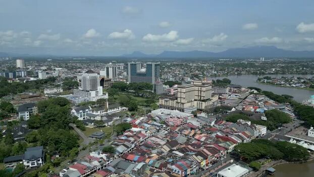 Aerial view of Kuching city skyline and Sarawak River Malaysia. Aerial view of Kuching city skyline and Sarawak River Malaysia.