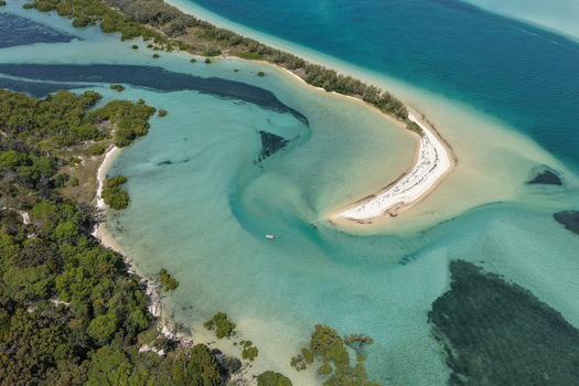 Aerial view of Moreton Island featuring turquoise waters winding sandbanks and lush mangrove forests in Kooringal Queensland Australia. Aerial view of Moreton Island featuring turquoise waters winding sandbanks and lush mangrove forests in Kooringal Queensland Australia.