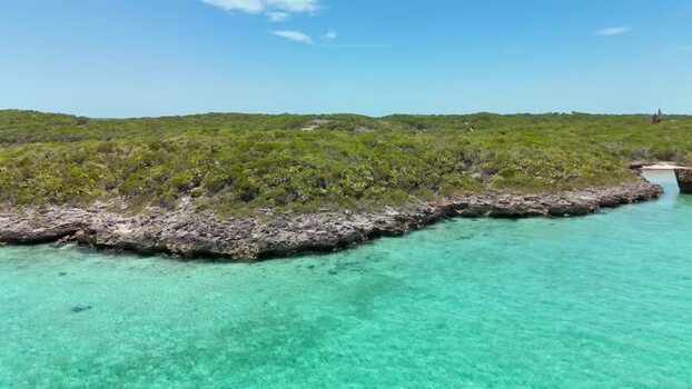 Aerial view of Crab Cay and turquoise waters The Bahamas.