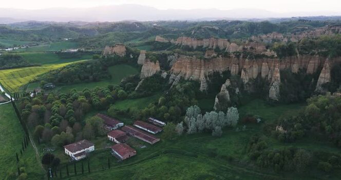 Aerial view of the Balze del Valdarno rock formations and farmhouses Italy. Aerial view of the Balze del Valdarno rock formations and farmhouses Italy.